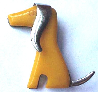BP133 butterscotch bakelite dog pin